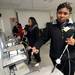 Cass Tech freshman Ariel Bowman, 14, operates a laproscopic surgery simulator during a tour o f the Clinical Simulation Center at University of Michigan Hospital on Thursday, Jan. 10. Melanie Maxwell I AnnArbor.com